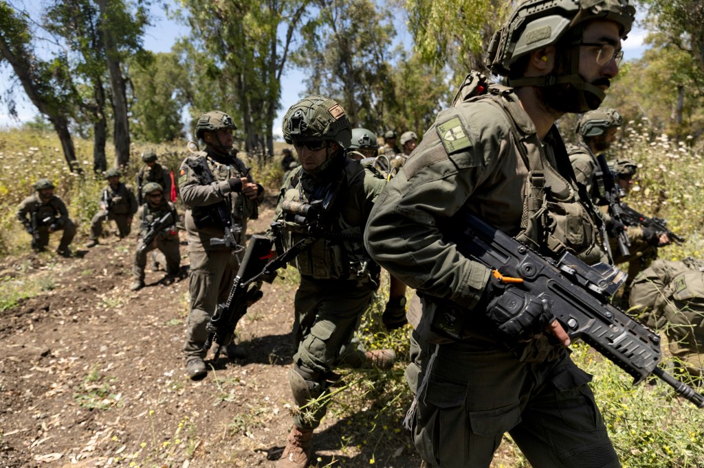  Israeli reserve combat soldiers of the 134th battalion take part at a training drill on May 8, 2024.