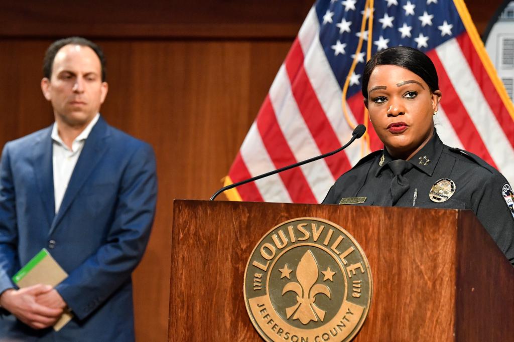 Louisville police chief Jacquelyn Gwinn-Villaroel, right, speaks to reporters as Louisville Mayor Craig Greenberg listens at left during a press conference addressing Scottie Scheffler's arrest on May 23, 2024,