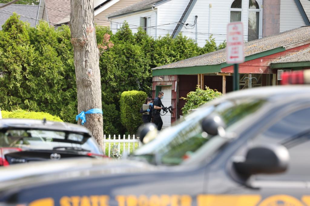NY State and Suffolk County police officers searching the home of Rex Heuermann in Massapequa, NY on May 20, 2024
