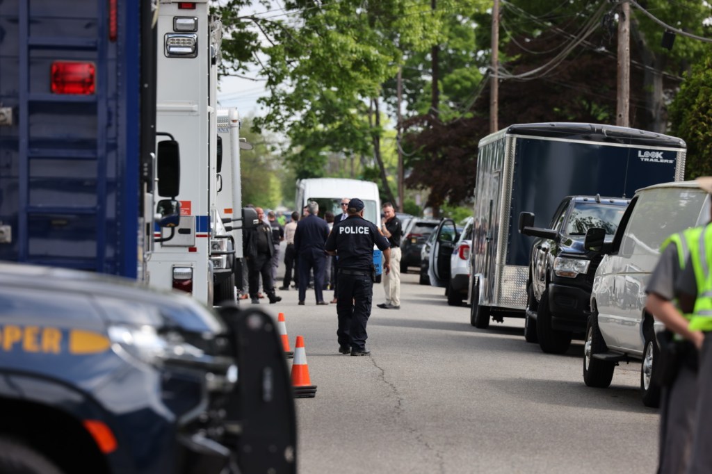 NY State and Suffolk County police officers searching the home of Rex Heuermann in Massapequa, NY on May 20, 2024