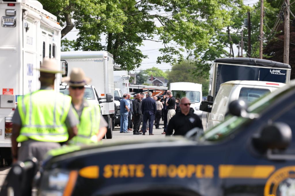 NY State and Suffolk County police searching a home in Massapequa, NY on May 20, 2024