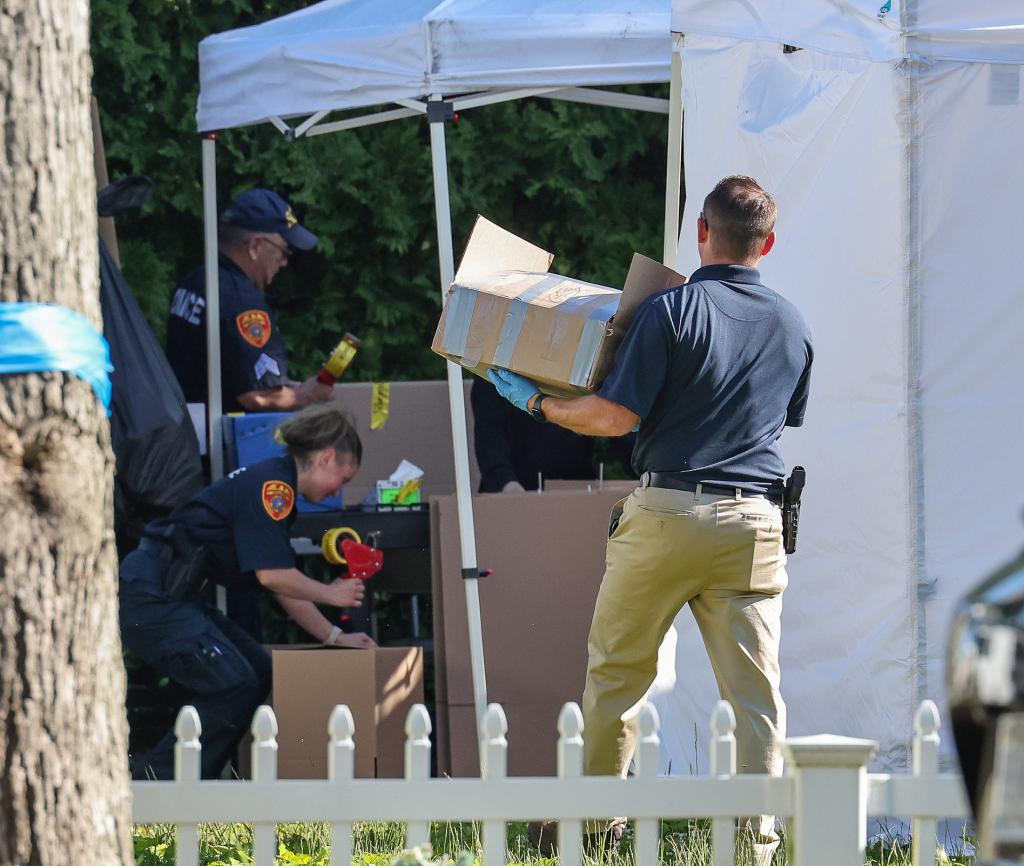 Police search Rex Heuermann's home.