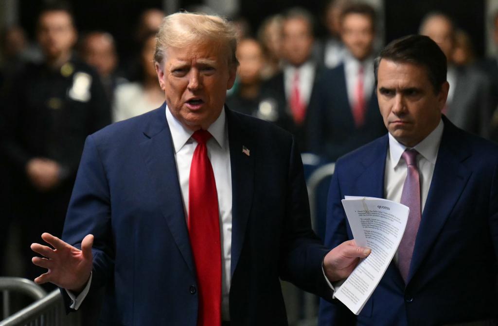Former President Donald Trump speaks to reporters as he arrives for his trial at Manhattan Criminal Court in New York on Thursday, May 16, 2024. Michael Cohen, a one-time fixer and personal attorney to Trump, is expected to continue testifying in the hush-money criminal trial against the former president.