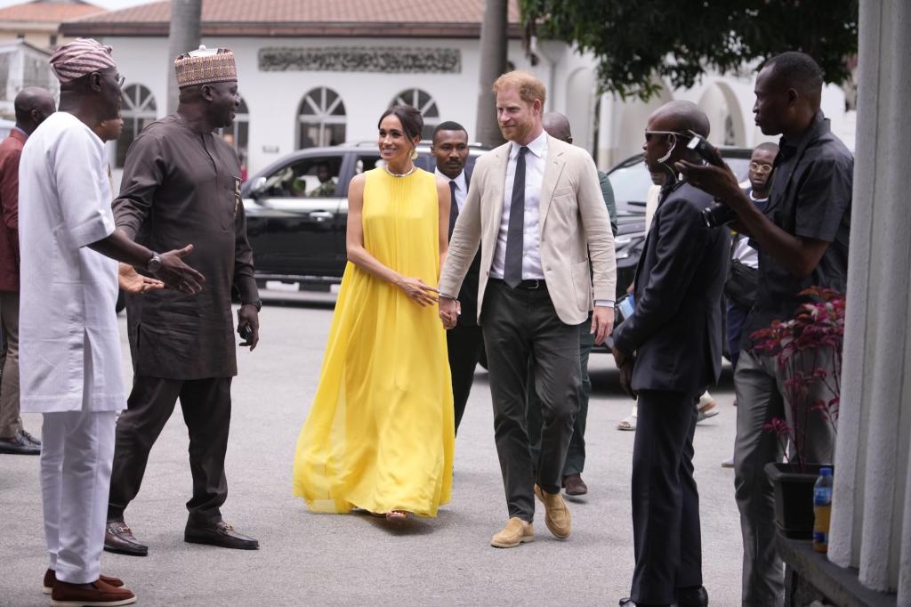 Lagos state governor BabaJide Sanwo-Olu welcoming Prince Harry and Meghan, the Duke and Duchess of Sussex, in Lagos, Nigeria for the Invictus Games