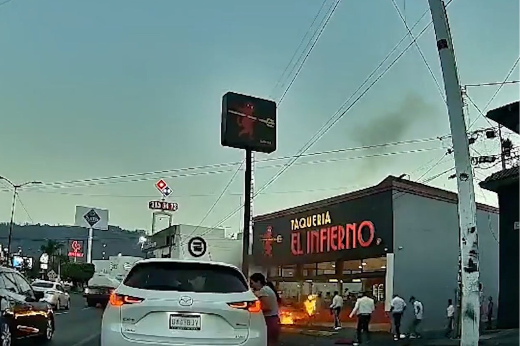 The performers were competing over a coveted spot outside a taco joint.