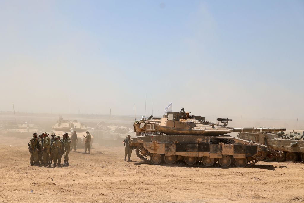 Israeli tanks line up at the border with the Gaza Strip. 