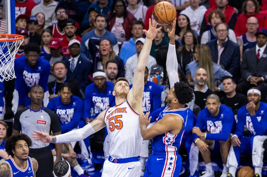 Isaiah Hartenstein #55 of the New York Knicks jumps to defend against Tobias Harris #12 of the Philadelphia 76ers during the first half of game 3 of the Eastern Conference first round at the Wells Fargo Center, Thursday, April 25, 2024, in Philadelphia, PA. 