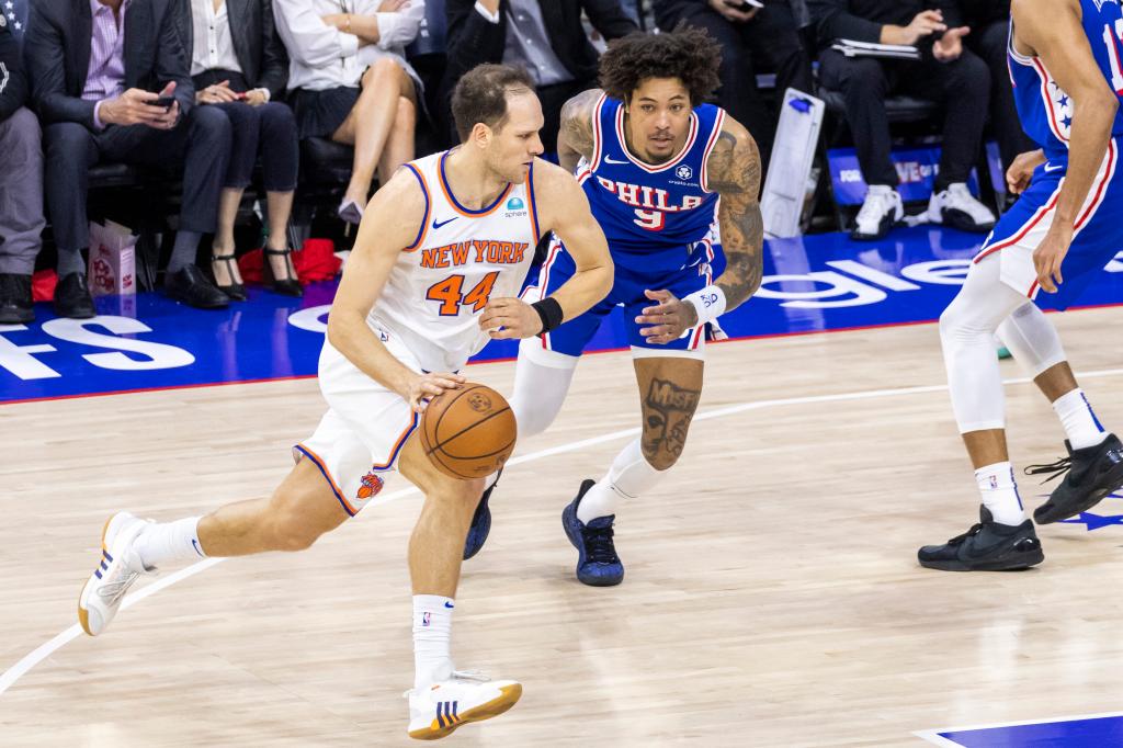 Bojan Bogdanovic #44 of the New York Knicks drives down court as Kelly Oubre Jr. #9 of the Philadelphia 76ers defends during the first half of game 3 of the Eastern Conference first round at the Wells Fargo Center, Thursday, April 25, 2024, in Philadelphia, PA. 