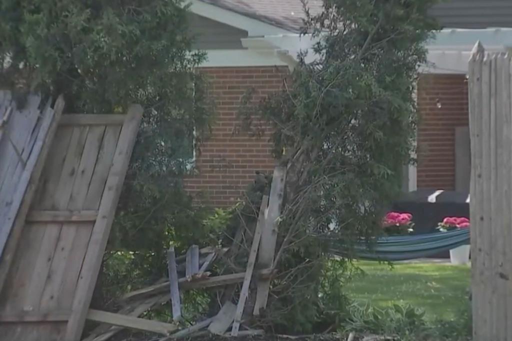 The back half of the teen's car was sent flying through a nearby fence and landing in a backyard.