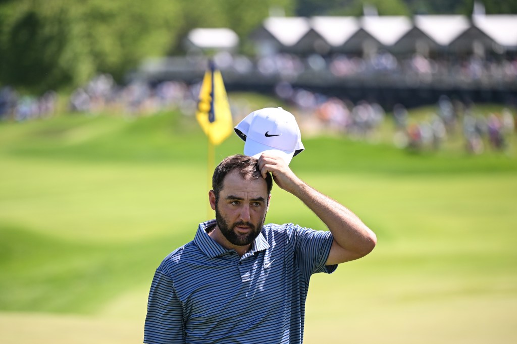 Scottie Scheffler of the United States walks off the 18th green during the final round of the 2024 PGA Championship at Valhalla Golf Club on May 19, 2024 in Louisville, Kentucky. 