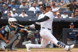 Juan Soto #22 of the New York Yankees hits an RBI single during the 7th inning when the New York Yankees played the Seattle Mariners