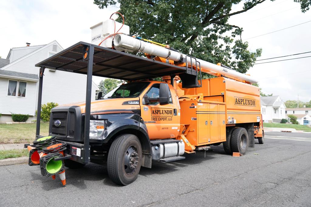 An Asplundh Tree Expert Company truck parked on the side of the road in Hawthorne, NJ