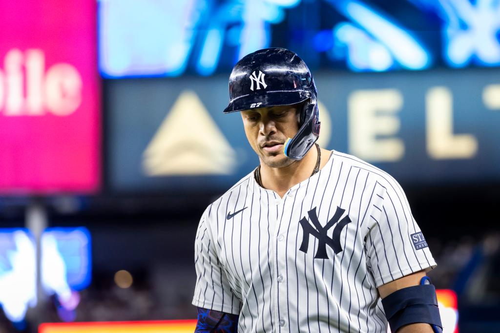 Giancarlo Stanton reacts after hitting into a double play in the Yankees' loss on Monday night.