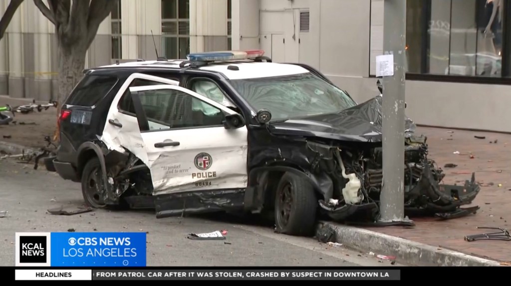 suspect stole a Los Angeles police SUV with a female cop still inside it before speeding off and crashing early Sunday.