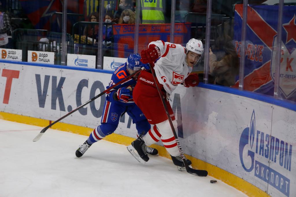 Mat Robinson (37) of SKA Saint Petersburg and Maxim Tsyplakov (9) of Spartak Moscow are seen in action during the 2021-22 KHL Regular season of the Kontinental Hockey League between SKA Saint Petersburg and Spartak Moscow at the Ice Sports Palace.Final score; SKA Saint Petersburg 1:2 Spartak Moscow.