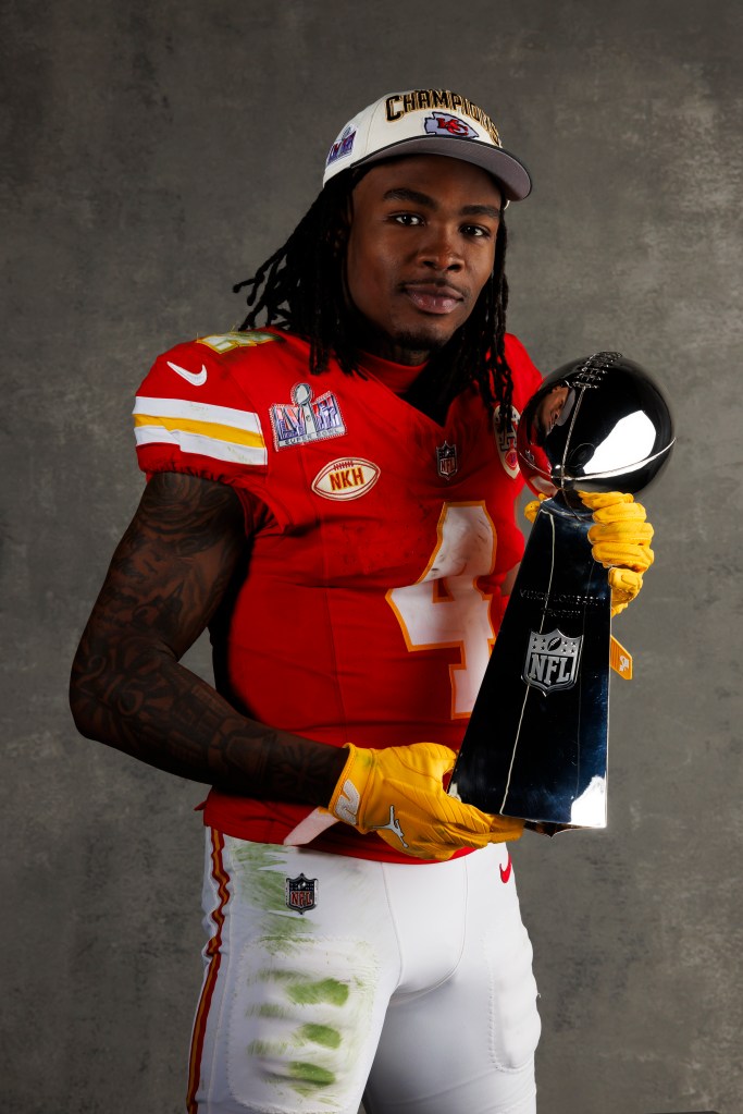 Rashee Rice #4 of the Kansas City Chiefs poses for a portrait with the Vince Lombardi Trophy after Super Bowl LVIII against the San Francisco 49ers at Allegiant Stadium on February 11, 2024 in Las Vegas, Nevada.