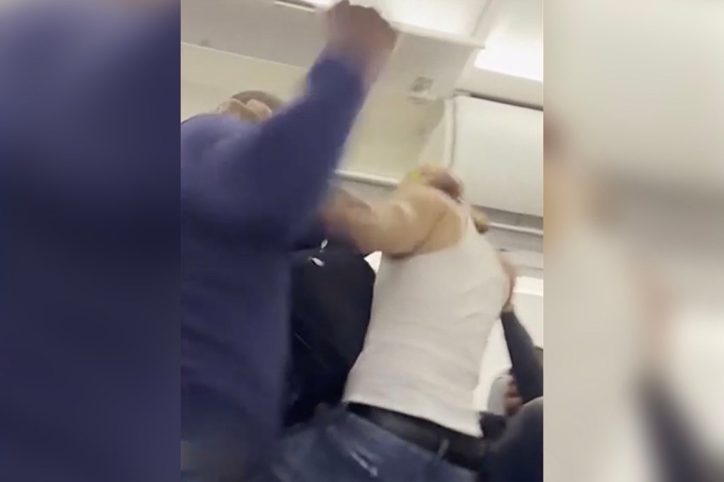 Two men got into a wild brawl after spending about two hours arguing with each other on a Spirit Airlines flight.