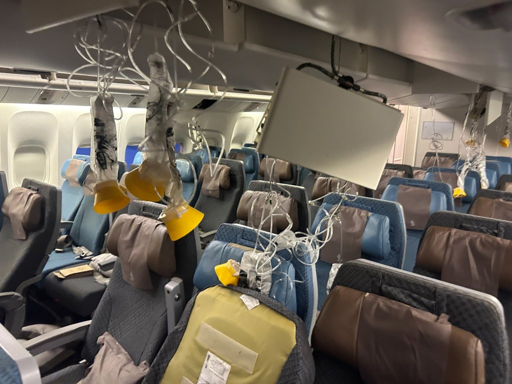 The carnage of the chaotic flight was visible in the cabin after passengers were offloaded for an emergency landing