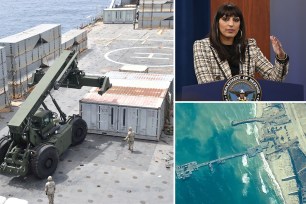 U.S. Navy personnel construct a JLOTS, which stands for "Joint Logistics Over-the Shore" temporary pier which will provide a ship-to-shore distribution system to help deliver humanitarian aid into Gaza, in an undated handout picture in the Mediterranean Sea