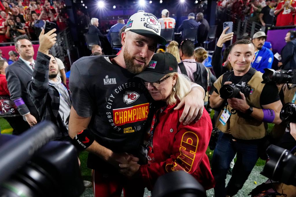 Travis Kelce #87 of the Kansas City Chiefs celebrates with Donna Kelce after defeating the Philadelphia Eagles 38-35 in Super Bowl LVII at State Farm Stadium on February 12, 2023 in Glendale, Arizona.