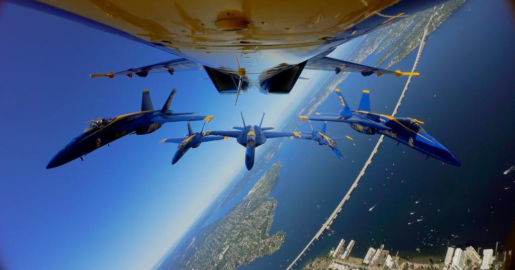 A group of blue jets flying in the sky from the documentary 'The Blue Angels' released by Amazon Prime.