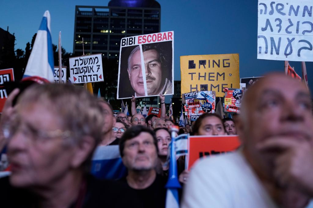 People protest against Israeli Prime Minister Benjamin Netanyahu's government and call for the release of hostages held in the Gaza Strip by the Hamas militant group, in Tel Aviv, Israel, Saturday, May 18, 2024.