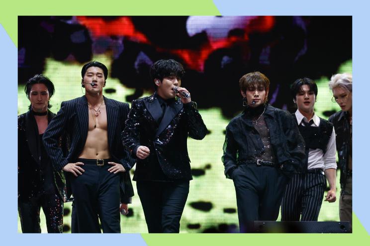 (L-R) Seonghwa, San, Choi Jong-ho, Kang Yeo-sang, Wooyoung, and Song Min-gi of ATEEZ perform at Coachella.