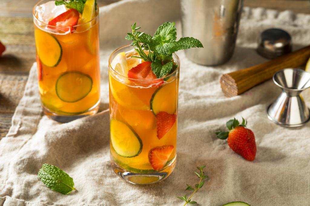 Sweet Refreshing Pimms Cup Cocktail with Fruit and Mint