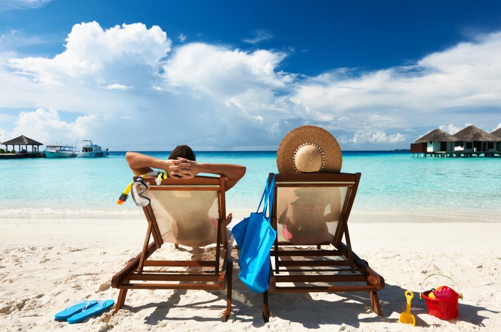 Couple on a tropical beach at Maldives