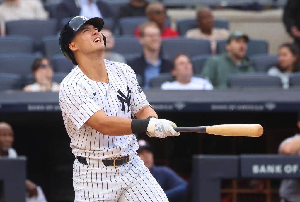 Anthony Volpe watches his two-run homer clear the right-field wall during the third inning of the Yankees' loss.