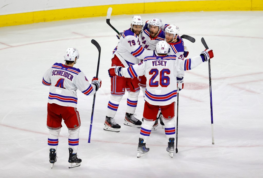 Rangers players after Barclay Goodrow's second-period goal in their 4-3 Game 4 loss to the Hurricanes.