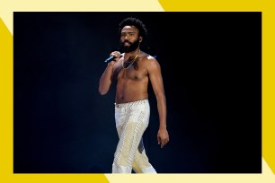 A shirtless Childish Gambino commands the stage.