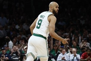 Derrick White celebrates after hitting one of the Celtics' 18 3-pointers in their Game 1 win over the Cavaliers.