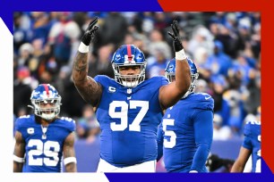 Dexter Lawrence riles up the crowd from the field.