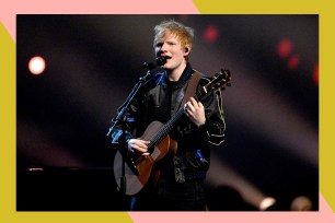 Ed Sheeran sings and plays guitar onstage.