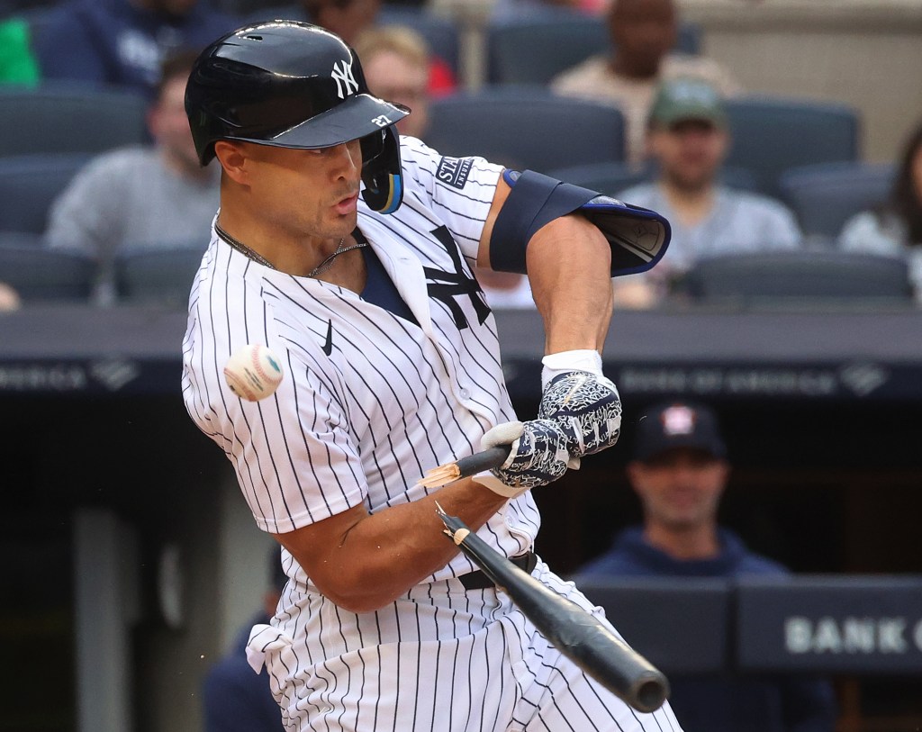 Gleyber Torres breaks his bat during the third inning in the Yankees' loss.