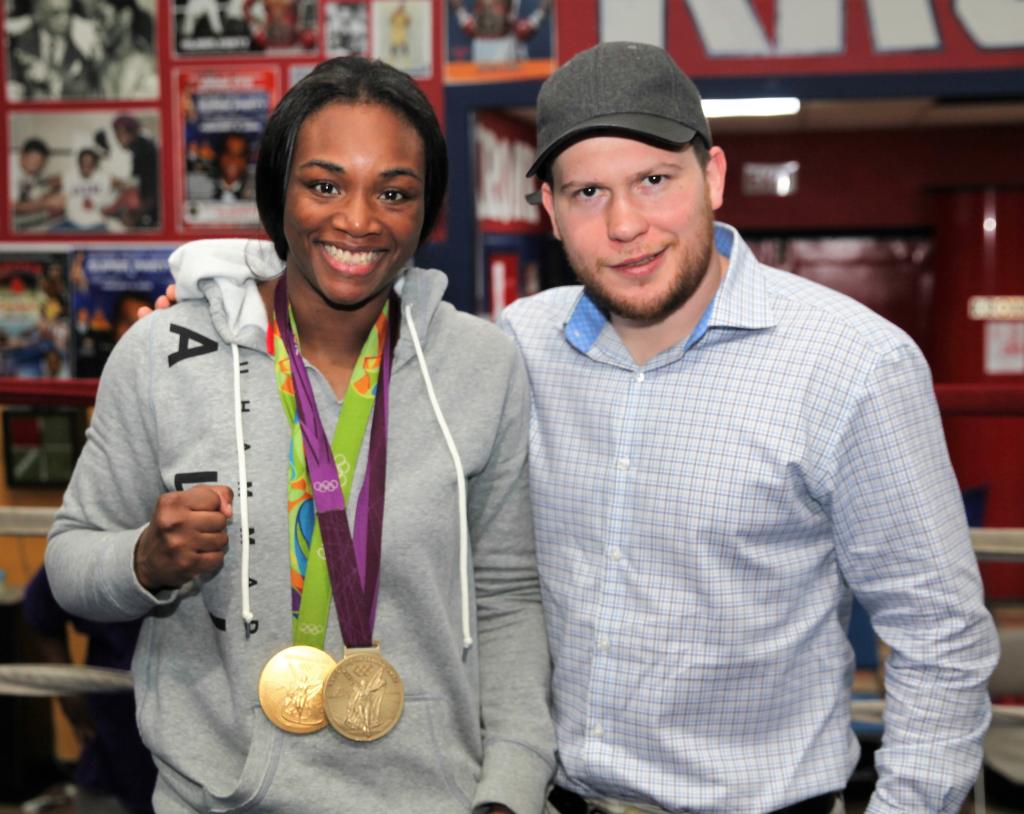 Dmitriy Salita (R.) with Claressa Shields