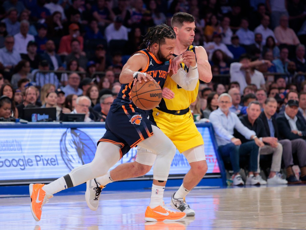 Jalen Brunson draws a foul on T.J. McConnel during the fourth quarter of the Knicks' Game 2 win.