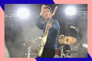 Johnny Marr rocks out on guitar.