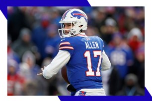 Buffalo Bills quarterback Josh Allen drops back to throw a pass.