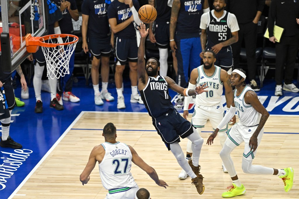 Kyrie Irving, who scored 30 points, shoots a floater during the Mavericks' Game 1 win.