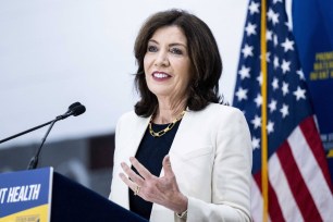 New York State Governor Kathy Hochul standing in front of a microphone addressing about efforts to improve maternal and infant health in Brooklyn, New York.