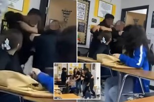 One student hurled a couple of punches at his classmate and grabbed the teacher, who inserted herself in between the students before he threw her aside and unleashed several more punches.
