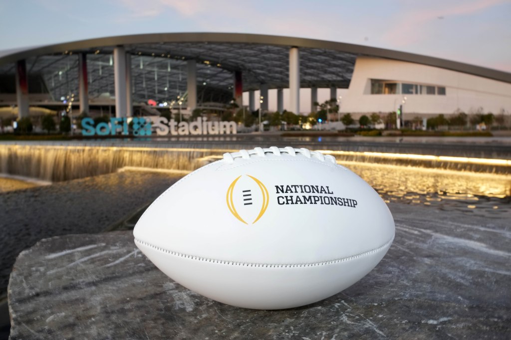 A football with the College Football Playoff national championship logo 