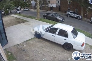 Video grabs taken from The Yeshiva World News of a white sedan with PA plates driving erratically by a school where video footage of an anti semitic attack occurred at a yeshiva.