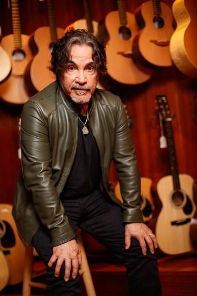 Oates in Rudy's Music store in Manhattan.