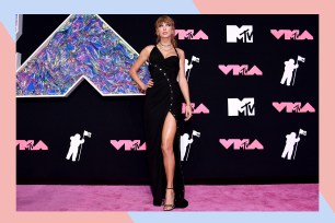 Taylor Swift strikes a pose on the red carpet.