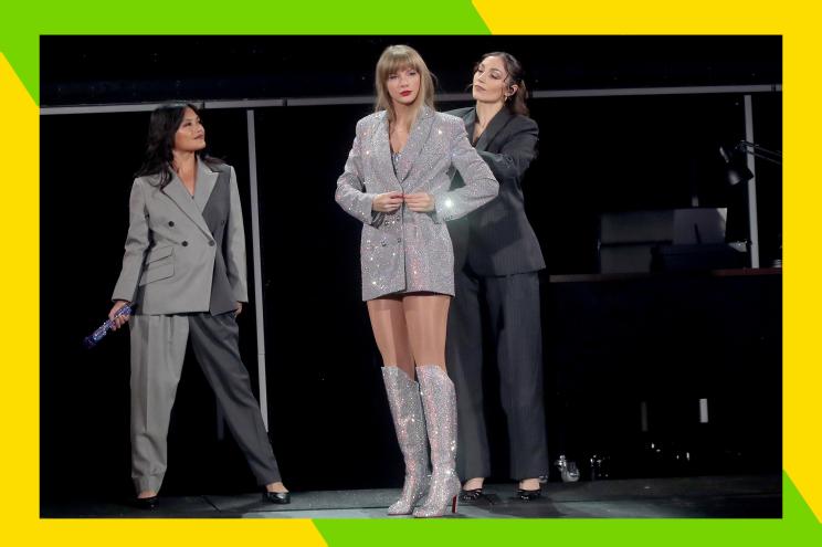 Taylor Swift suits up mid 'Eras Tour' show.