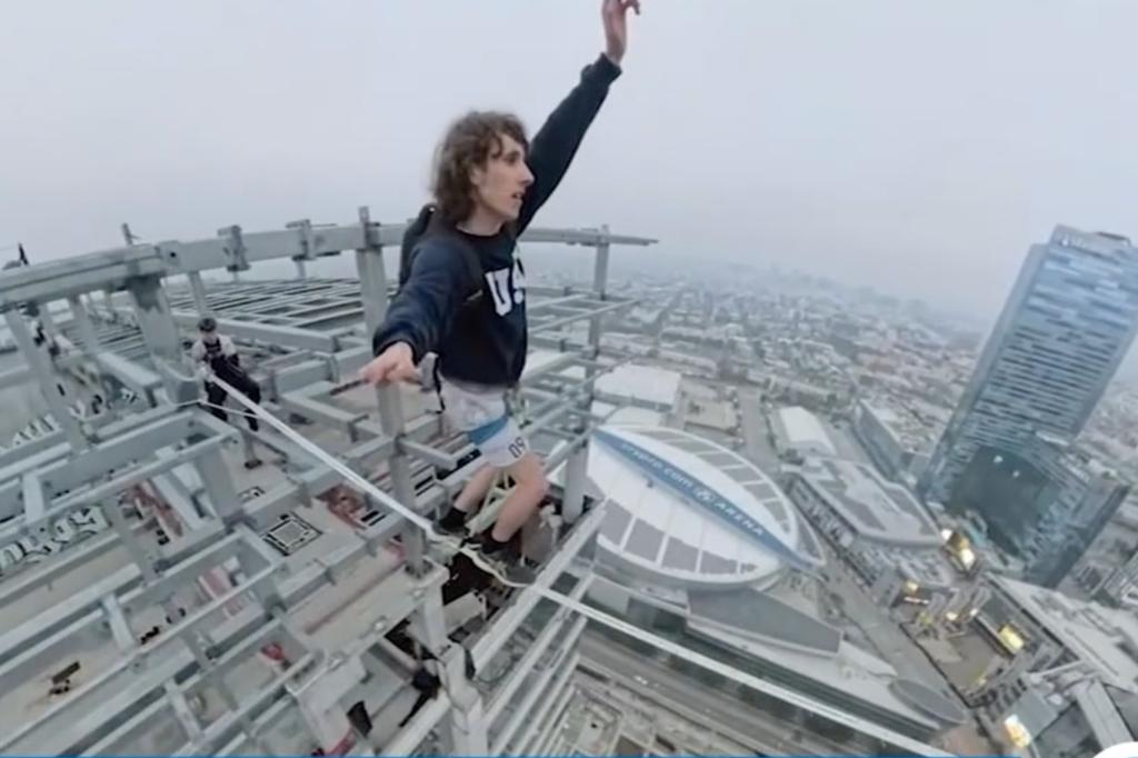 The 28-year-old successfully made it from one side to the other as he kept his arms extended to keep his balance while a few buddies caught the heart-pounding moment on tape, including with the help of a drone.
