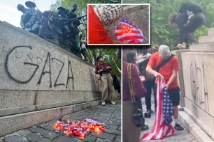 a protester burns an american flag